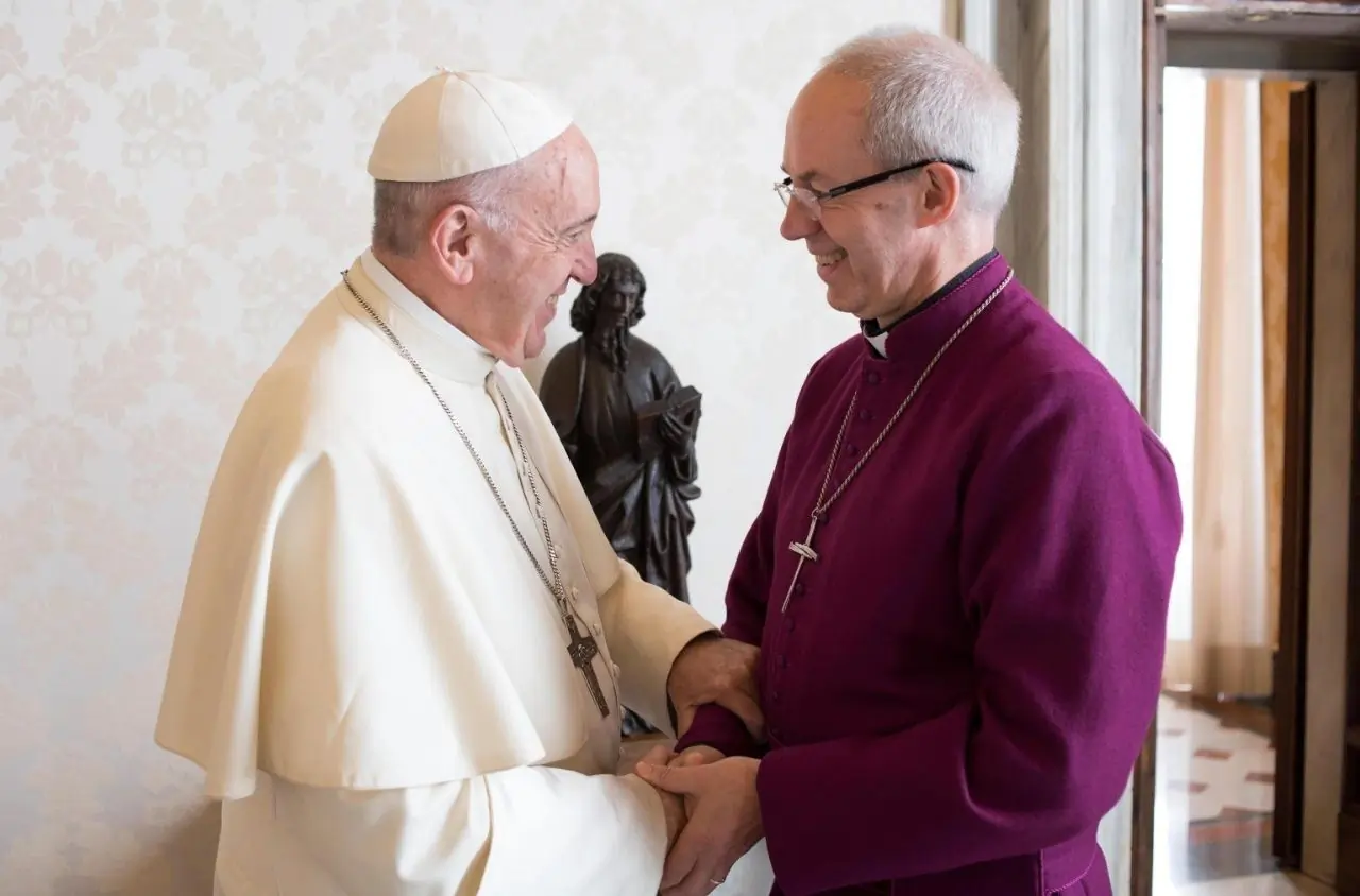 Pope Francis greets Archbishop of Canterbury Justin Welby during a private audience at the Vatican Oct. 27, 2017