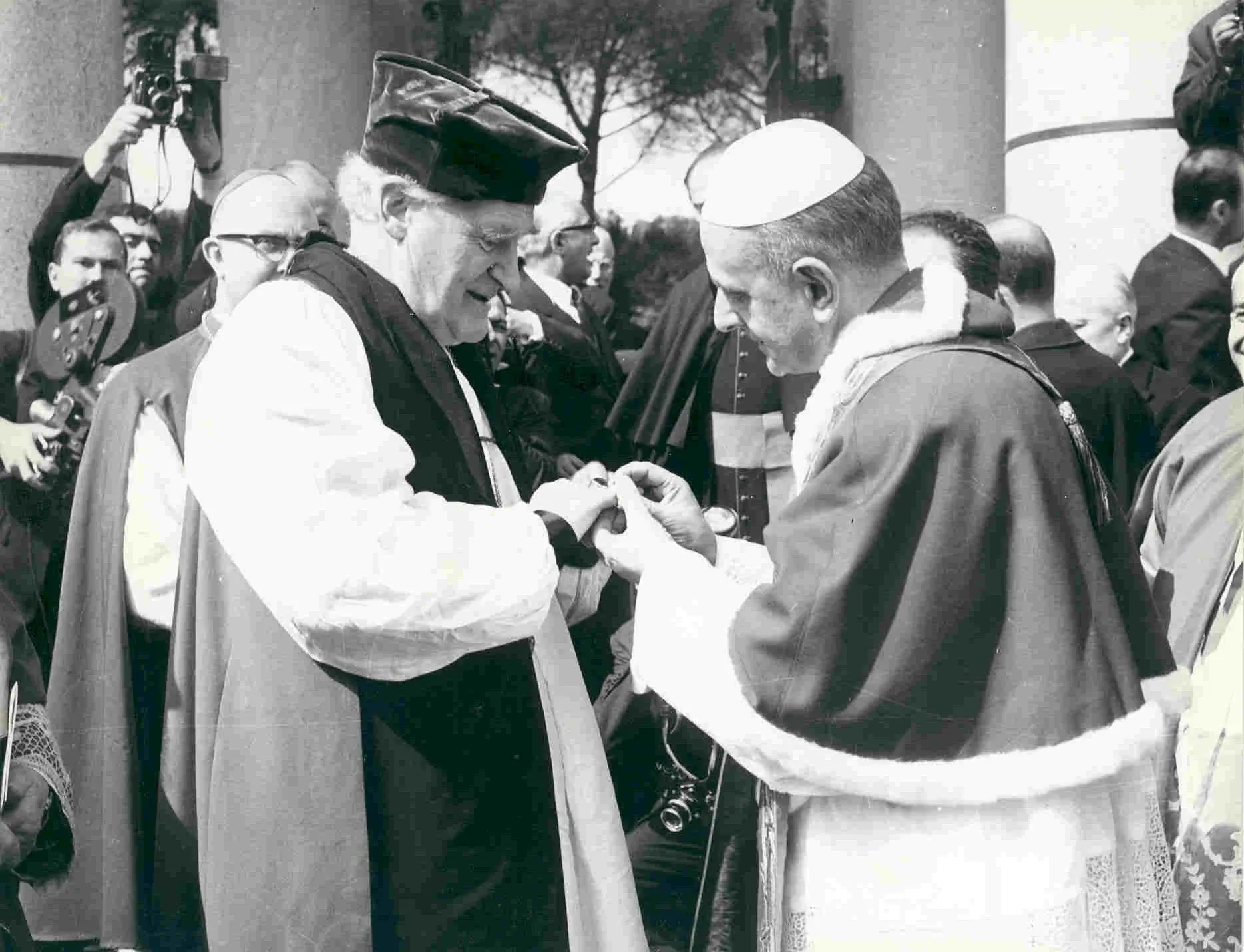Pope Paul VI places his episcopal ring on the finger of the Anglican Archbishop of Canterbury Michael Ramsey