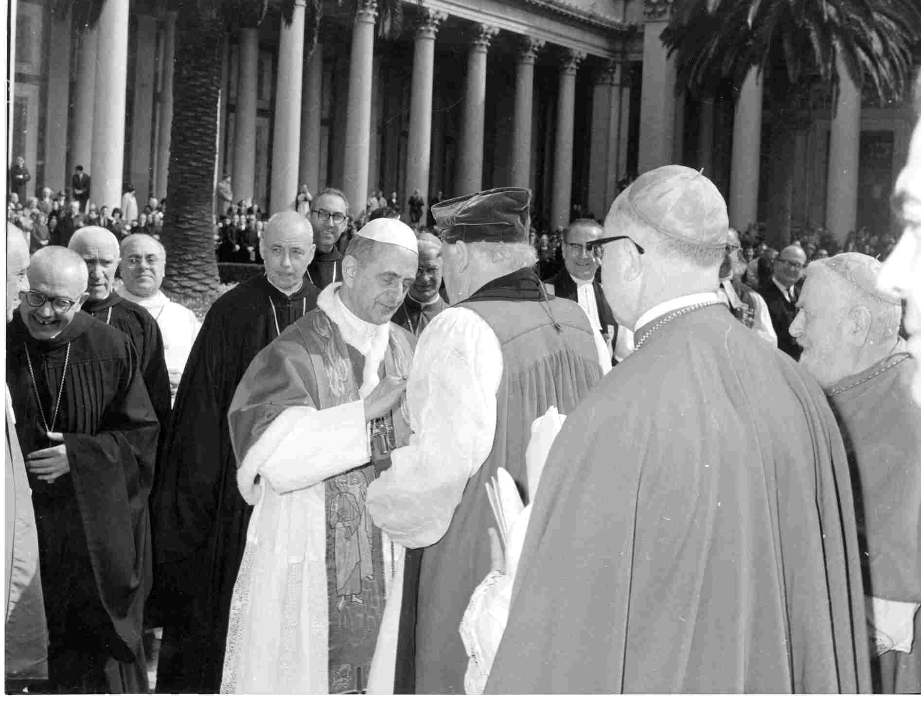 Pope Paul VI places his episcopal ring on the finger of the Anglican Archbishop of Canterbury Michael Ramsey