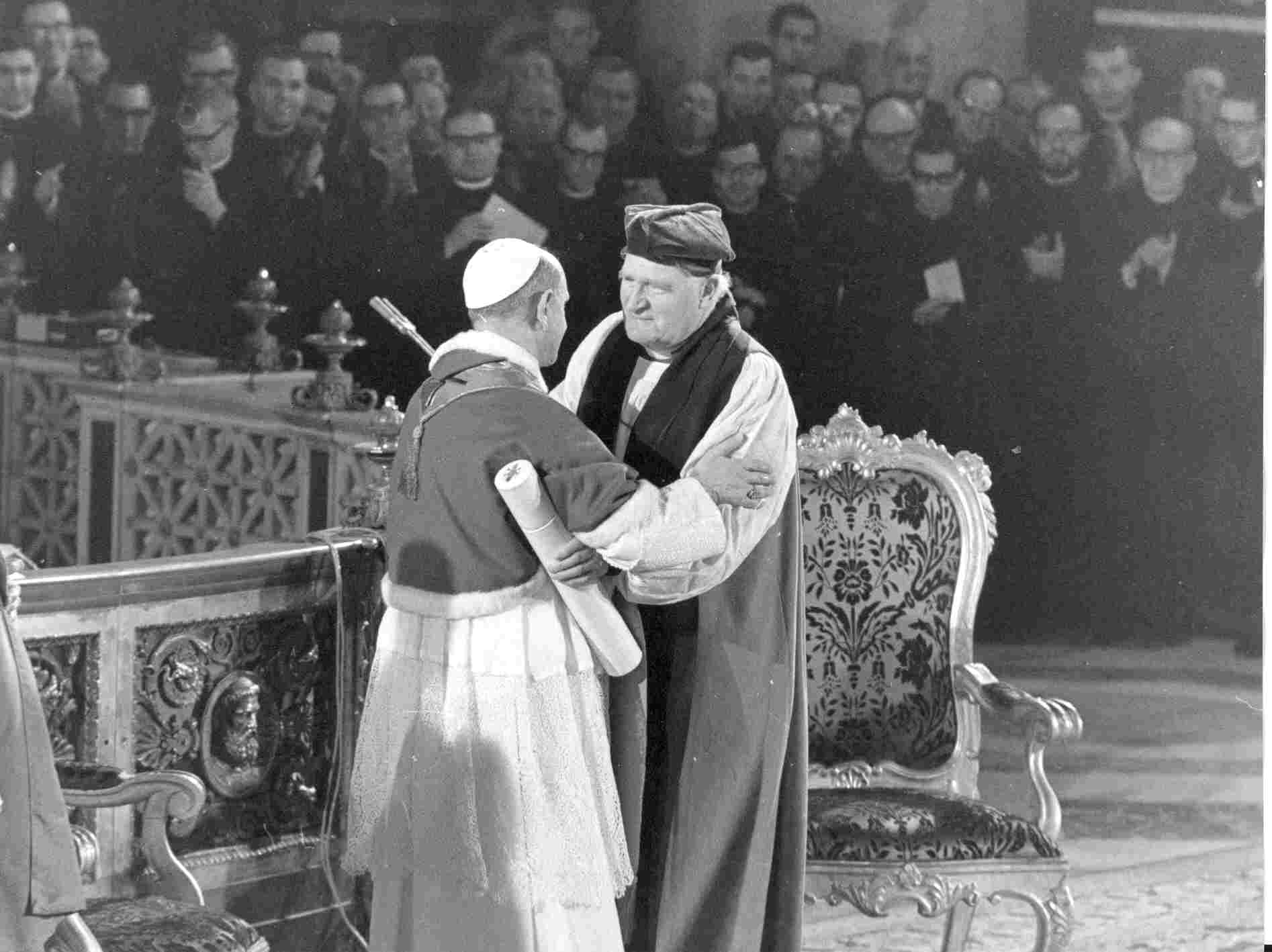 Archbishop Michael Ramsey and Pope Paul VI embrace after signing Common Declaration (visible in the Archbishop's left hand)