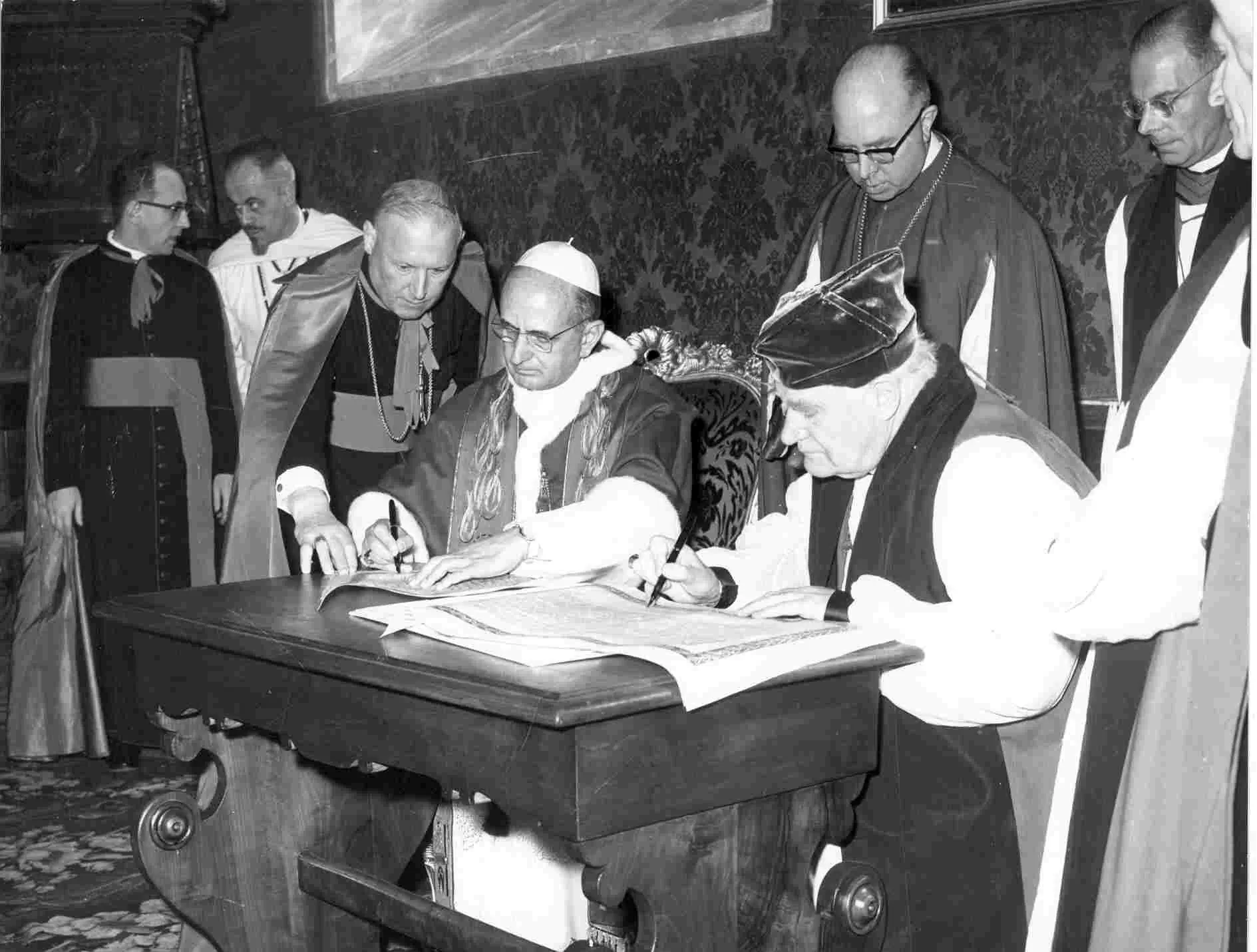 Pope Paul VI and Archbishop Michael Ramsey sign the first Common Declaration