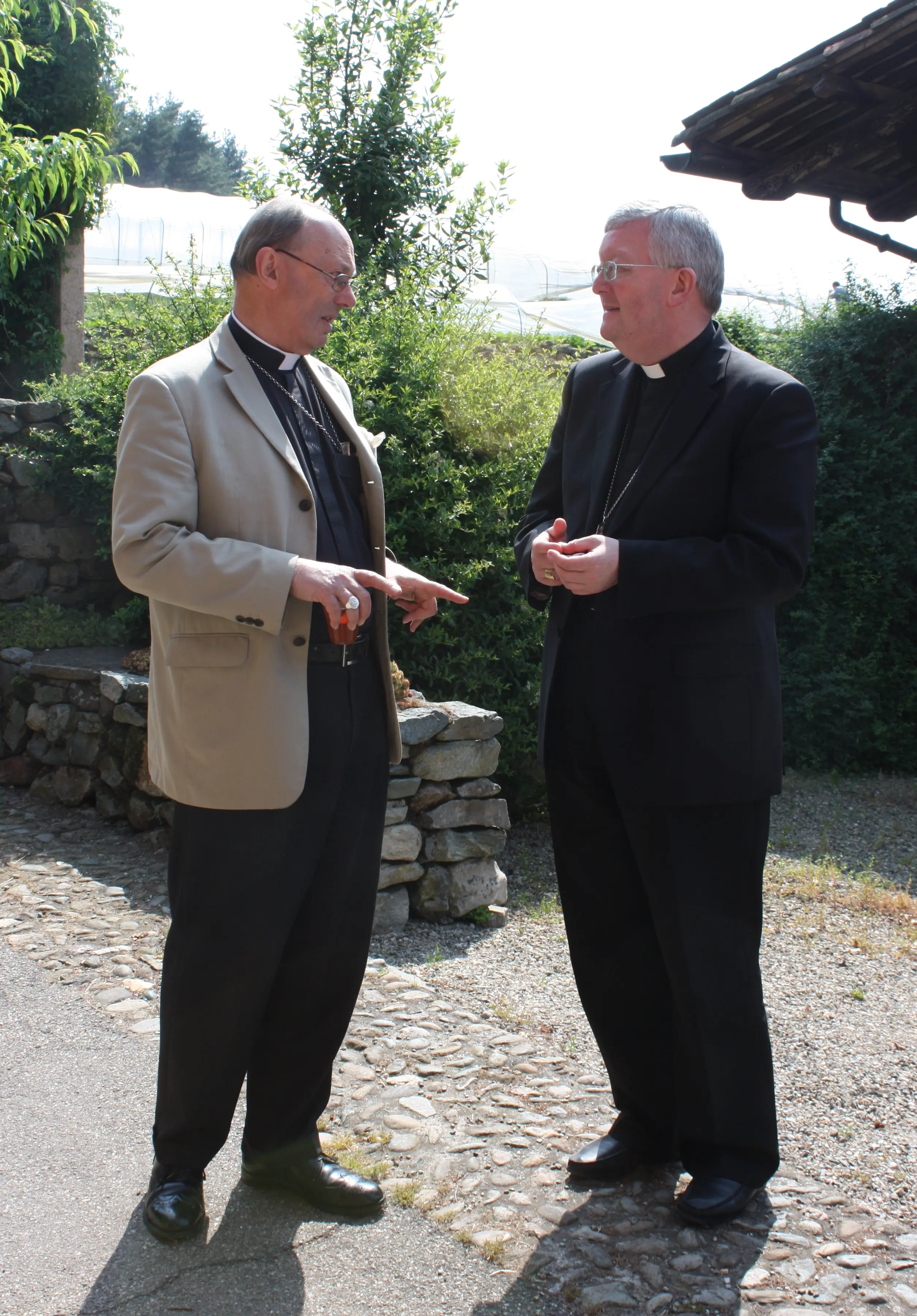 Bishop Christopher Hill and Archbishop Bernard Longley talking during a break from the ARCIC meeting at Bose