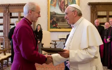 Archbishop of Canterbury Justin Welby greets Pope Francis during visit to Rome