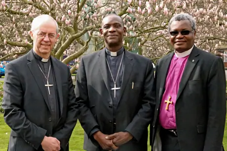 The Rt. Rev. Josiah Idowu Fearon (centre) with Archbishop Justin Welby of Canterbury (left) and Bishop James Tengatenga, chair of the Anglican Consultative Council (right)