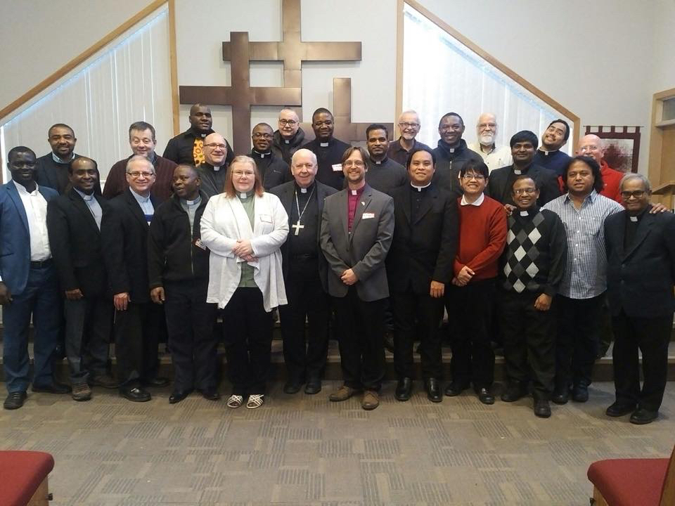Anglican and Roman Catholic clergy at their one-day ecumenical conference in Slave Lake, Alta., Nov. 15, 2017. Wearing the purple shirt, in the front row, is Fraser Lawton, bishop of the Anglican diocese of Athabasca; to his right is Gérard Pettipas, archbishop of the Roman Catholic archdiocese of Grouard-McLennan