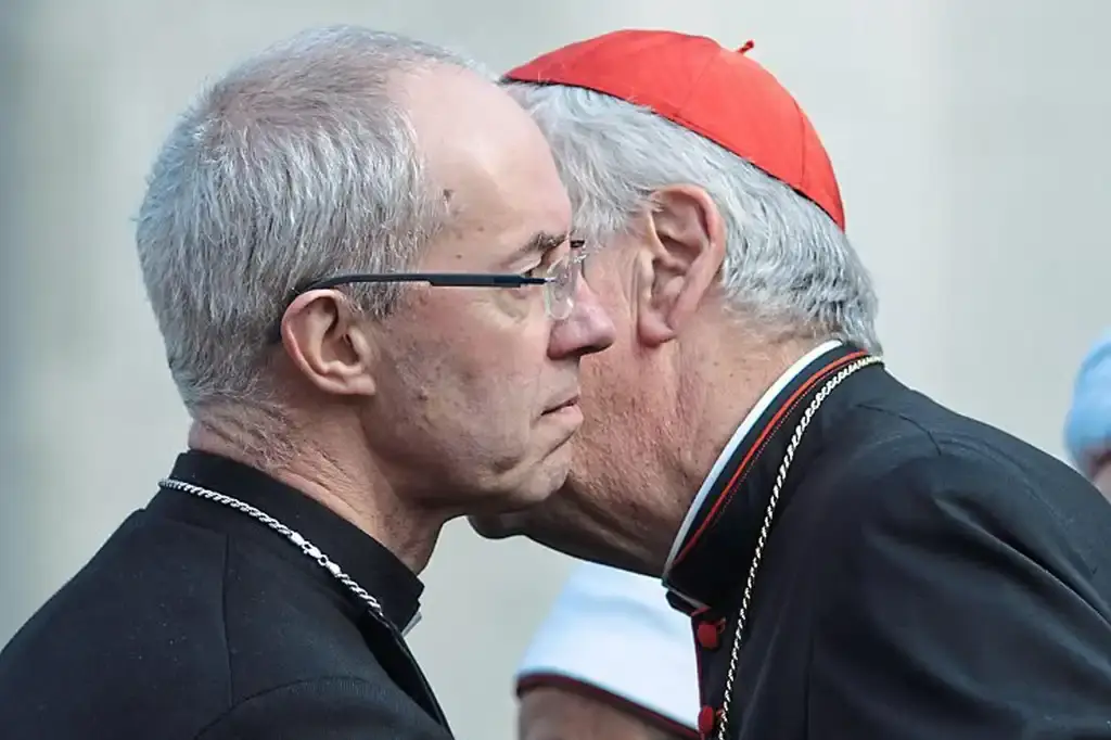 Christians united: the Archbishop of Canterbury greets the Archbishop of Westminster, Cardinal Vincent Nichols