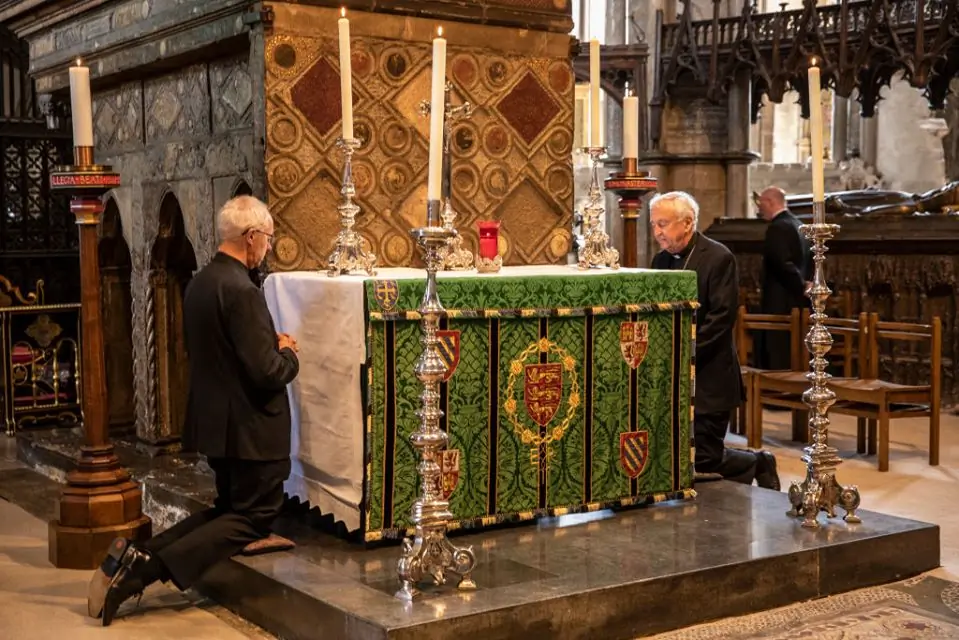 Archbishop Justin Welby and Cardinal Vincent Nichols pray at the Shrine of St Edward the Confessor in Westminster Abbey on the first day of re-opening after the COVID-19 shutdown