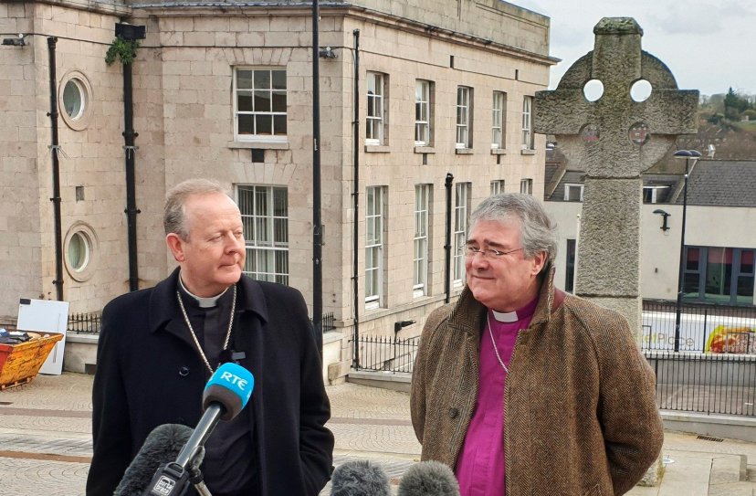 Archbishop Eamon Martin of Armagh, Northern Ireland, and Anglican Archbishop John McDowell of Armagh speak to media in Market Place Square in Armagh