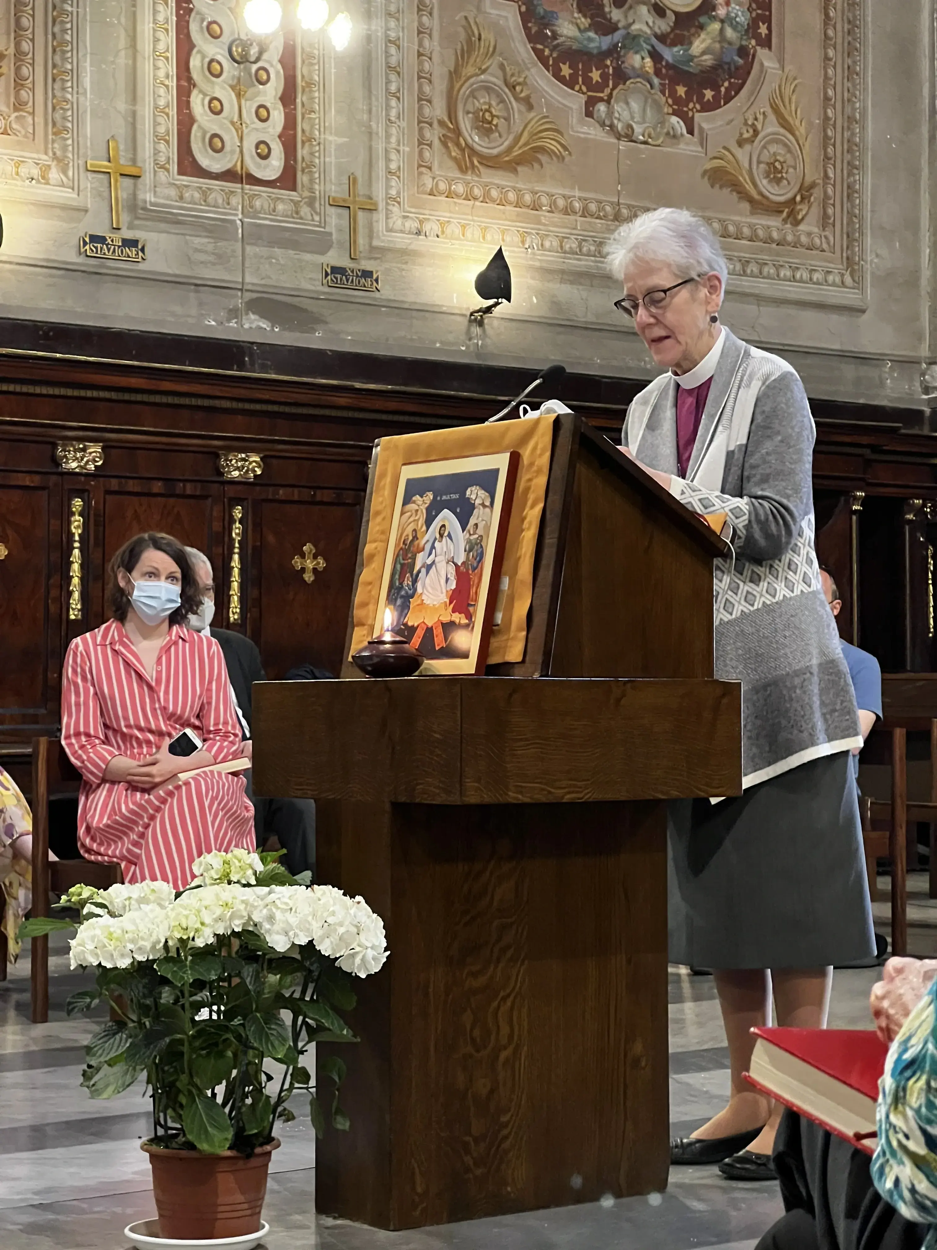 Archbishop Linda Nicholls reads scripture at Caravita