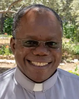 The Reverend Canon Garth Minott