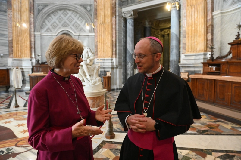 Archbishop Sarah Mullally talks with Bishop Flavio Pace, secretary of the Dicastery for Promoting Christian Unity, at the Apostolic Palace