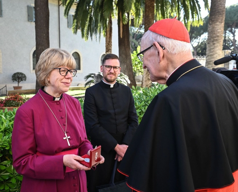 Archbishop of Canterbury Sarah Mullally is greeted by Cardinal James Michael Harvey, archpriest of the Basilica of St Paul Outside the Walls