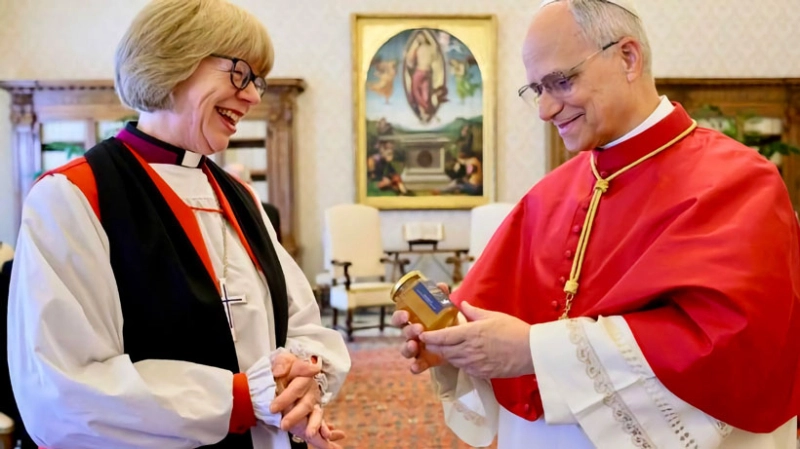 Archbishop of Canterbury Sarah Mullally delivers a gift of honey from Lambeth Palace to Pope Leo XIV