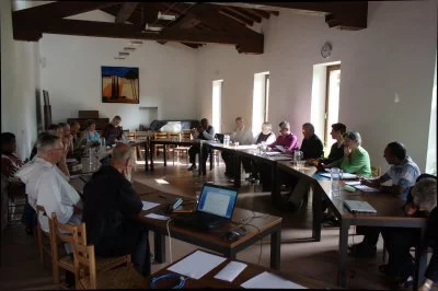 ARCIC III members at Bose seated around the dialogue table