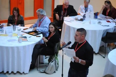A special session of the Anglican Church of Canada's Council of General Synod was held to discuss the report of the Commission on the Marriage Canon. The Rev. Capt. Marc Torchinsky from the Anglican Military Ordinariate of Canada, raises a question after the marriage canon commission presented its report