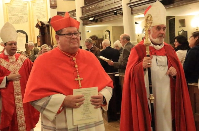 Coadjutor Bishop Bruce Myers, Cardinal Gérald Lacroix and Bishop Dennis Drainville recess out of the Cathedral of the Holy Trinity in Quebec City following the dedication of a bishop's chair for Lacroix earlier this year