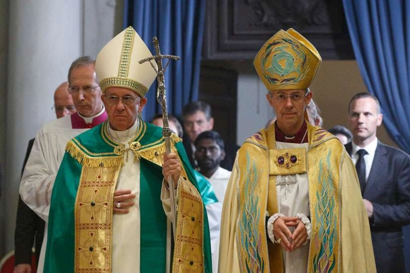 Pope Francis and Archbishop Justin Welby entering San Gregorio al Celio for Vespers with the IARCCUM bishops