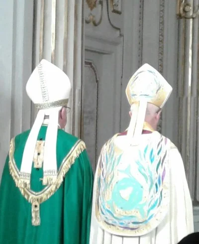 Pope Francis and Archbishop Justin Welby stop to pray at the throne of St. Gregory during the recessional after Vespers at San Gregorio al Celio