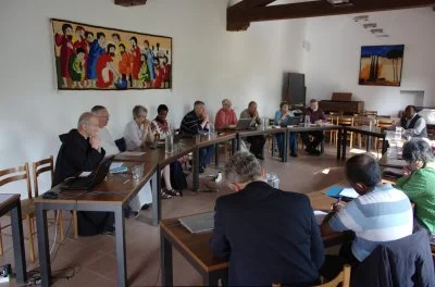 ARCIC III members at Bose seated around the dialogue table