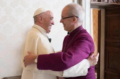 Pope Francis greets Archbishop of Canterbury Justin Welby during a private audience at the Vatican Oct. 27, 2017