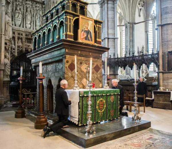 Archbishop Justin Welby and Cardinal Vincent Nichols pray at the Shrine of St Edward the Confessor in Westminster Abbey on the first day of re-opening after the COVID-19 shutdown