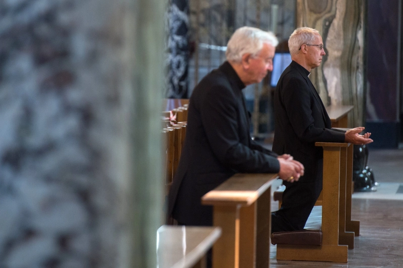 Cardinal Vincent Nichols and Archbishop Justin Welby praying at Westminster Cathedral on the first day of re-opening after COVID-19 shutdown