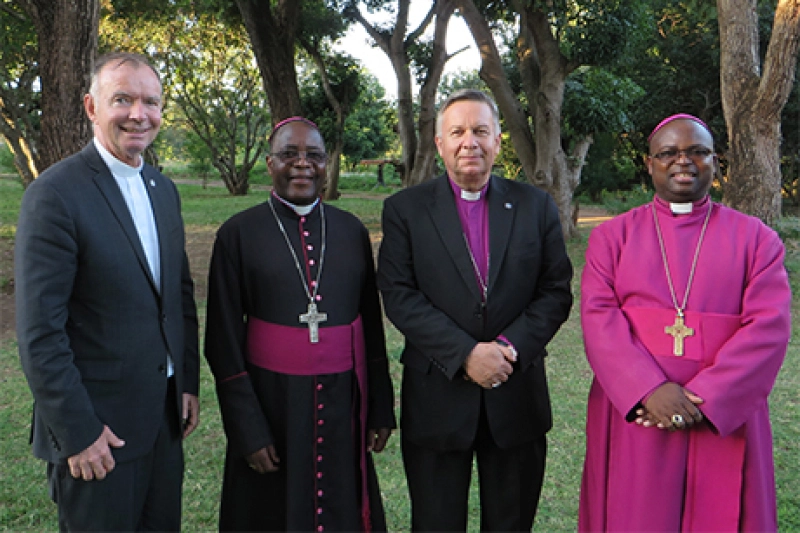 Fr. Keith Pecklers, SJ, Bishop Montfort Stima, Archbishop David Moxon, and Bishop Brighton Vitta Malasa