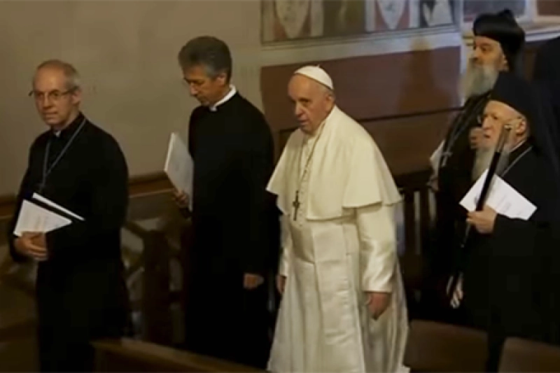 The Archbishop of Canterbury Justin Welby with the Ecumenical Patriarch Bartholomew and Pope Francis at an ecumenical prayer for peace service in Assisi