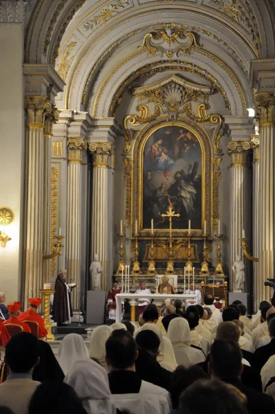 Pope Benedict XVI (center) listens as Archbishop of Canterbury Rowan Williams delivers a homily during papal vespers March 10 at San Gregorio Magna al Celio in Rome, during a service to mark the 1000th anniversary of the founding of Italy's Camaldoli monastic community