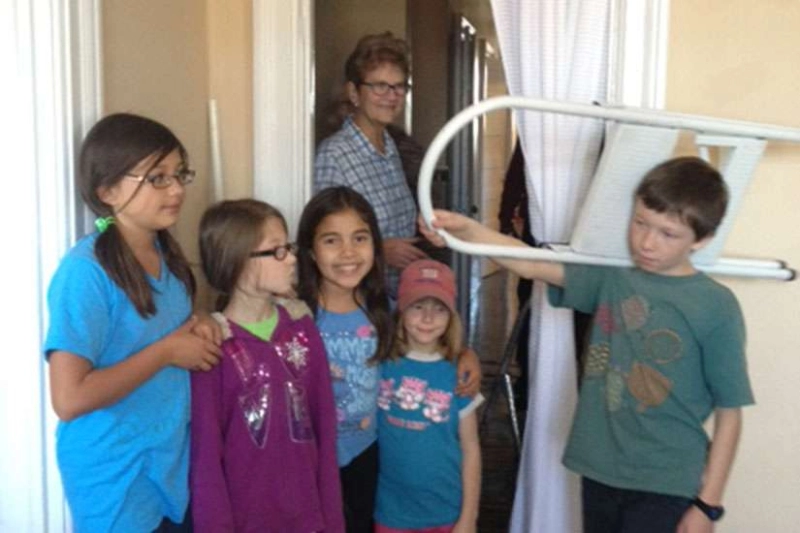 Children from Brockville Wesleyan Church help Agape Brockville move in furniture and prepare an apartment for a refugee family from Eritrea. The refugee family is expected to arrive in November