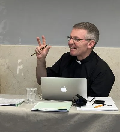Fr Tony Currer gestures during ARCIC III meeting at Villa Aurelia, Rome