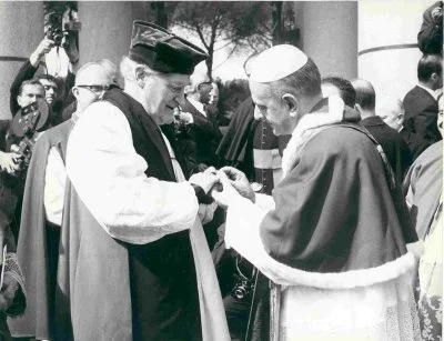 Pope Paul VI places his episcopal ring on the finger of the Anglican Archbishop of Canterbury Michael Ramsey