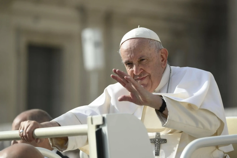 Pope Francis greets the faithful during his weekly General Audience