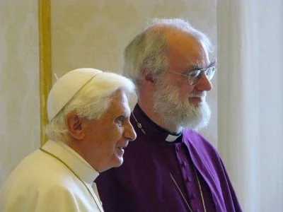 Pope Benedict XVI and the then-Archbishop of Canterbury, Rowan Williams, hold a private meeting in the Pope's study at the Vatican