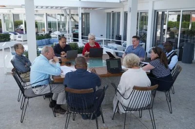 Some of the members of ARCIC III at the dialogue meeting in Larnaca, Cyprus. Clockwise: Archbishop Linda Nicholls, Revd Alexander Ross, Fr Paul Béré SJ, Dr Kristin Colberg, Dr Moeawa Callaghan, Bishop Garth Minott, Bishop Christopher Hill, Revd Albino Barrera OP, and Dr Emmanuel Nathan