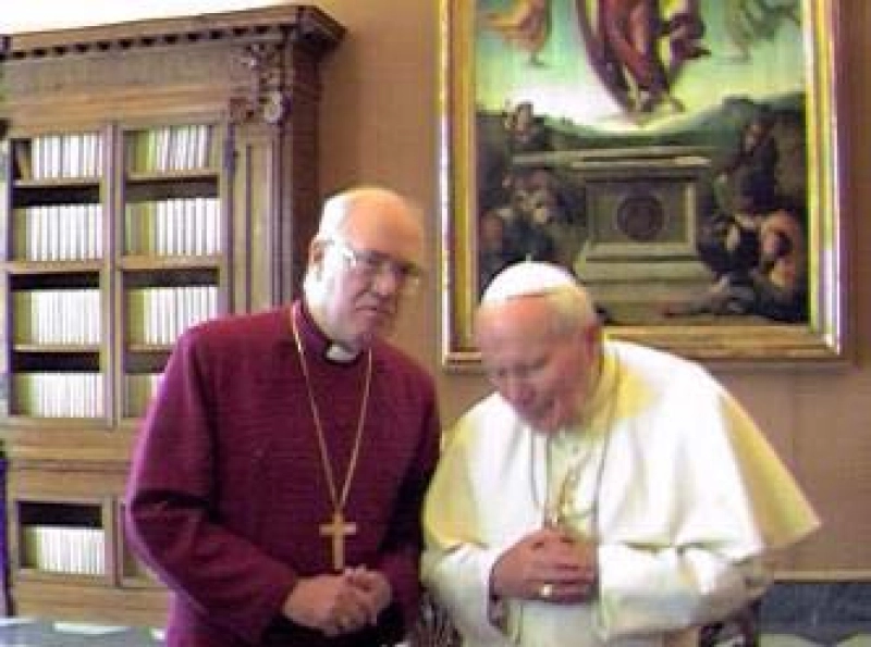 Archbishop of Canterbury George Carey and Pope John Paul II meet in the Apostolic Palace in Rome