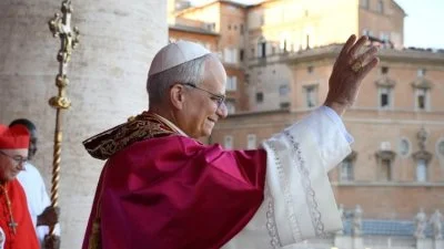Pope Leo XIV appears on the loggia in St. Peter's Basilica after his election as the 267th pope and bishop of Rome
