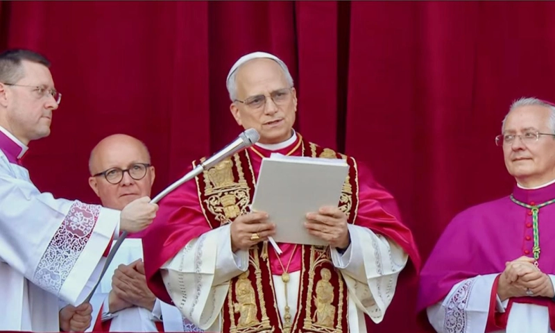 Pope Leo XIV appears on the loggia in St. Peter's Basilica after his election as the 267th pope and bishop of Rome