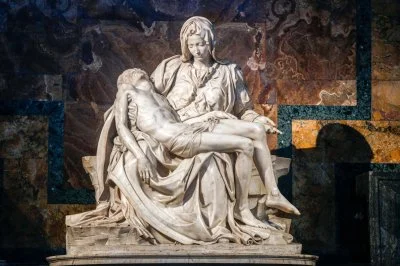 Michelangelo's Pietà, in St. Peter's Basilica, Rome. The sculpture depicts the moment when Jesus, taken down from the cross, is given to his mother Mary
