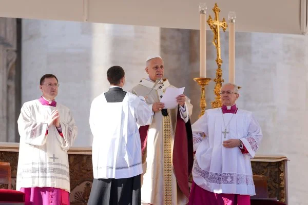 Pope Leo XIV speaks to visitors and pilgrims after Mass for the feast of Christ the King and the Jubilee of Choirs in St. Peter’s Square at the Vatican. The pope announced he was releasing 'In Unitate Fidei' ('In the Unity of Faith'), marking the 1,700th anniversary of the Council of Nicaea and its Creed