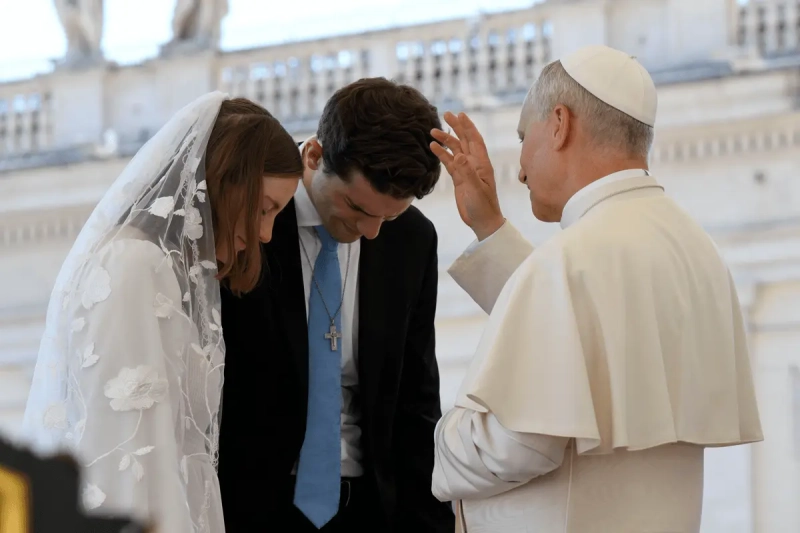 Pope Leo XIV blesses a newlywed couple