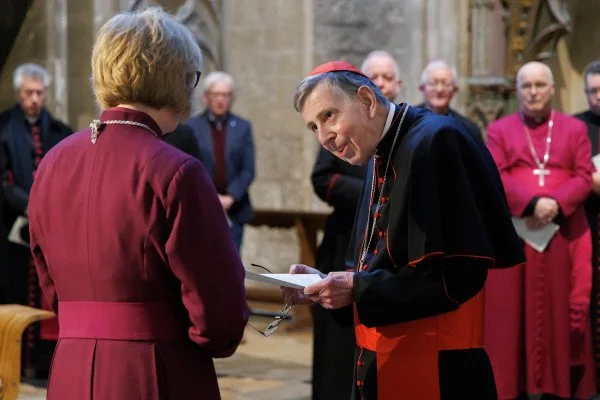 Cardinal Kurt Koch reads a letter from Pope Leo XIV to Archbishop of Canterbury Sarah Mullally